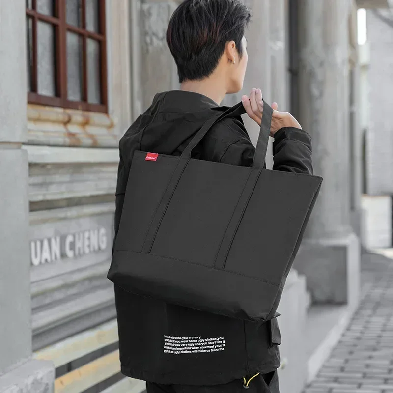 حقائب يد رجالية على الطراز الي - مراجعة Shopper Tote Canvas وسعره